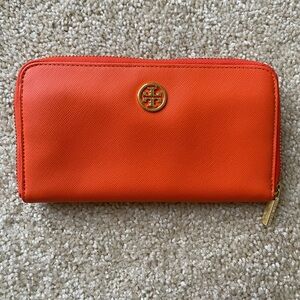 Orange leather Tory Burch zip around wallet